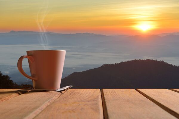 A calm morning moment with a mug in soft light